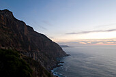 Ocean and rocky coast at dusk, Chapman's Peak Drive, Cape Town, South Africa, Africa