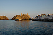 The Al Marani Fort off the coast of Muscat in the sunlight, Muscat, Oman, Asia