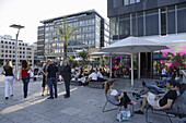 People sitting in a bar at little castle square, Stuttgart, Baden-Wurttemberg, Germany