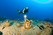 Diver and Artifacts of USS Apogon Submarine, Marshall Islands, Bikini Atoll, Micronesia, Pacific Ocean