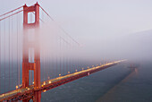 Golden Gate Bridge obscured by fog, San Francisco. California, USA