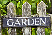Garden sign on gate, England