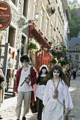 Canada, Quebec City, Lower Town, Rue Sous Le Fort, historic buildings, ghost walking tour guides, actors, costume