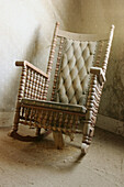 An old rocking chair in a Bodie residence, CA, USA
