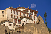Full moon over Lamayuru Monastery, biggest Buddhist gompa in Ladakh, in highly eroded alpine desert near Leh, Ladakh