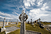Celtic cross in Na Seacht dTeampaill (Seven Curches) graveyard celtic remains. Inishmore, biggest of Aran Islands. Galway Co. Ireland