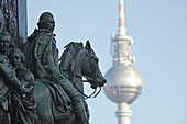 equestrian statue, memorial, Alter Fritz, Frederik the Great, with the Alex Television tower, Berlin Germany