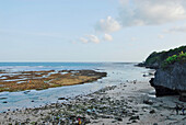 Rocky coast and beach at low tide, Pura Geger, Southern Bali, Indonesia, Asia