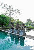 Deserted pool with elephant statues at Chedi Club, GHM Hotel, Ubud, Indonesia, Asia