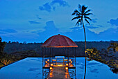 Water basin with pavilion on the roof of a restaurant in the evening, Kupu Kupu Barong Resort, Ubud, Indonesia, Asia