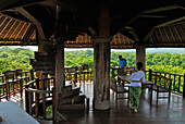 People on a canopied terrace, Menjangan Djungle & Beach Resort, West Bali, Indonesia, Asia