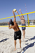 Beach 2 on 2 volleyball played at The Pier Beach Naples Florida