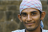 Portrait of young Indian man in Santacruz district, Mumbai, Maharashtra, India