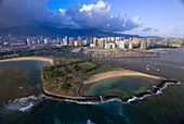 Aerial view of Ala Moana Regional Park (Magic Island) with Ala Wai Yacht Harbor and Waikiki in back, Honolulu, Oahu, Hawaii, USA