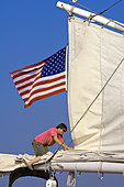 Taking down the sails, Schooner Nathaniel Bowditch, Pulpit Harbor, Penobscot Bay, Maine USA