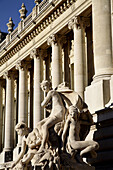 Stone statues decorating the entrance of Petit Palais. Paris. France
