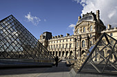 Pyramids of Musee du Louvre with Richelieu Wing in the background. Paris. France
