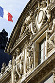 Building decoration on the facade of Sully Wing of Musee du Louvre. Paris. France