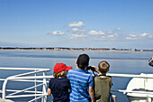 Children on a ferryboat, Foehr island, North Frisian Islands, Schleswig-Holstein, Germany