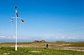 Flagpole at Hooge hallig, North Frisian Islands, Schleswig-Holstein, Germany