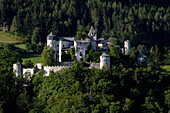 Prösels castle amidst green trees, Fie allo Sciliar, Valle Isarco, South Tyrol, Italy, Europe