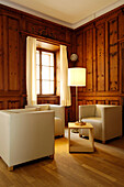Interior view, Lounge area with chairs, Gasthof zum Gruenen Baum, Glurns, Vinschgau, South Tyrol, Italy