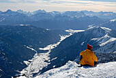 Man enjoying the views into the valley, Antholz valley, Puster valley, South Tyrol, Italy