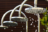 Shower heads with drops of water, Therme Meran, Thermal spa, Merano, South Tyrol, Italy