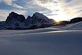 Mountain landscape in Winter at sunrise, Seiser Alp, Langkofel Mountain Range, South Tyrol, Italy