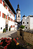 Village centre with Hotel zum Turm and the parish church of St Peter and Paul, Kastelruth, Castelrotto, South Tyrol, Italy