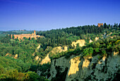 Monte Oliveto Maggiore abbey under blue sky, Tuscany, Italy, Europe