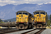 Two Union Pacific trains in British Columbia, Canada, in Canadian Pacific territory.