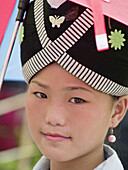 Close up of Hmong girl with traditional dress, Luang Prabang, Laos