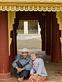 Happy Burmese couple under temple in Bagan, Myanmar