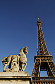 Statue on Pont de l'Alma with Eiffel Tower in background, Paris, France