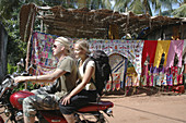 Arambol Goa, India: young foreigners on a bike