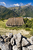 Teitos (typical dwellings). Braña de Mumián, Somiedo Natural Park. Asturias. Spain