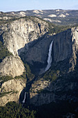The upper and lower falls of Yosemite falls in early morning at YosemiteNational Park in California, USA. The Upper Fall is the tallest in North America