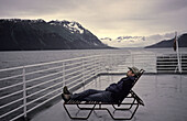 Man on deck of boat, Alaska