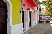 Coloured houses and restaurant at the Moll de Llevant in the harbour, Mao, Port Mahon, Minorca, Balearic Islands, Spain