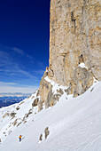 Woman backcountry skiing, Rotwand, Rosengarten group, Dolomites, Trentino-Alto Adige/Südtirol, Italy