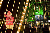 Illuminated Santa and the KaDeWe department store at Christmas, Berlin, Germany