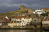 Whitby, parish church of St. Mary, Norman tower, 18th century, harbour, waterfront, quays, boats, North Yorkshire, UK