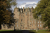 Glamis Castle, former royal hunting lodge, home of the Bowes-Lyon family, built in 15th-16th centuries, Angus, Scotland, UK