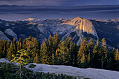 Alpenglow on clouds above Half Dome and Tenaya Canyon, from atop Sentinel Dome, Yosemite National Park, CALIFORNIA