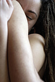 Adult, Adults, Arm, Arms, Bare, Closed eyes, Color, Colour, Contemporary, couple, couples, detail, details, Dreadlock, Dreadlocks, embrace, embracing, Eyes shut, hug, hugging, human, indoor, indoors, interior, Intimacy, Long hair, Long haired, Long-haired