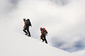 Mountaineer climbing Snowy Mountain