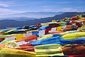 Prayer flags on top of jizu shan mountain, yunnan, China