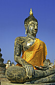 Thailand, Sukhothai, statue of sitting Buddha with sash