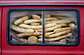 Bread baguettes in a van, Santoña, Cantabria, Spain